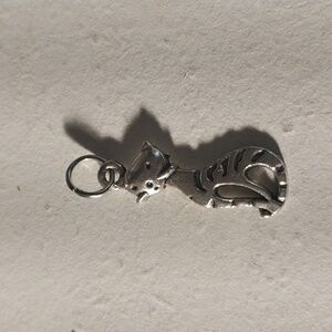 Silver cat charm